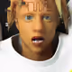 10702