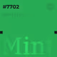 7702