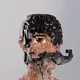 9883