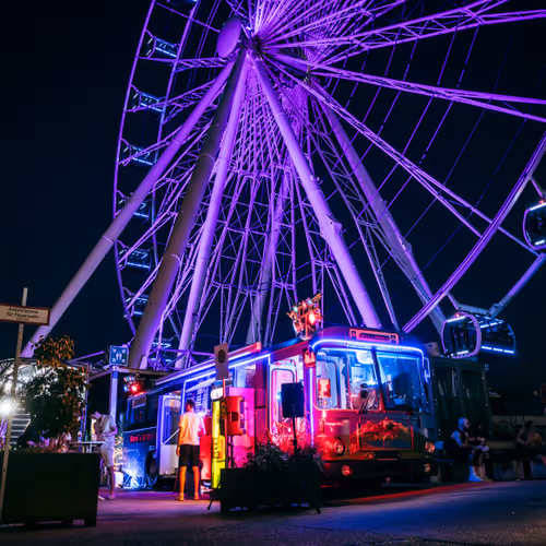 München im Licht: Riesenrad im Werksviertel-Mitte. Мюнхен в свете: Riesenrad im Werksviertel-Mitte. Munich in Lights: Riesenrad in Werksviertel-Mitte.