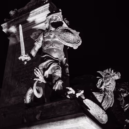 Putto vs The Basilisk — Shadows of Munich