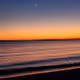 An Observation of Sunsets and Moon Rises During Solar Cycle 25