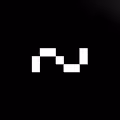 U+007E