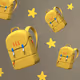 Aku's Yellow Backpack