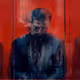 Salesman in a red elevator