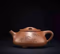 Dark-red enameled pottery