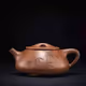 Dark-red enameled pottery