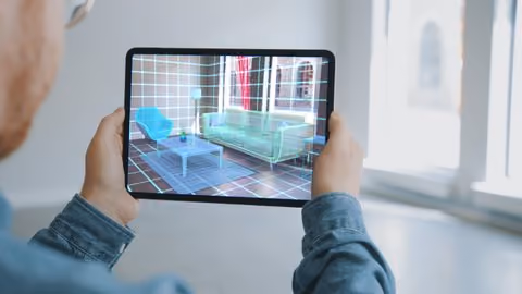 Decorating Apartment_ Man Holding Digital Tablet with_yyth