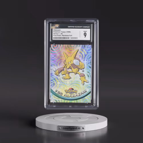 1999 Series 1 (Oval Nintendo Seal) #65 Alakazam - First Print (Blue Topps Logo) Rainbow Foil (Smooth
