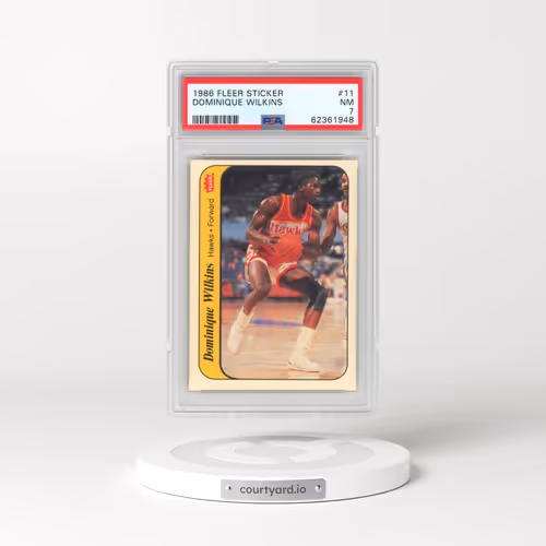 1986 Fleer Sticker #11 Dominique Wilkins (PSA 7 NM)