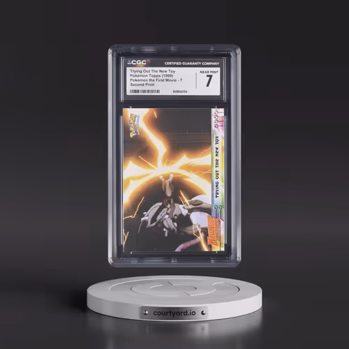 1999 Pokémon the First Movie #7 Trying Out The New Toy - Second Print (Black Topps Logo) (CGC 7 NM)