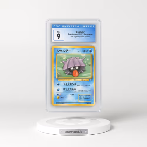 1997 The Mystery of the Fossils Shellder (CGC 9 MINT)