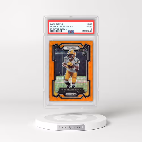 2023 Panini Prizm #333 Dontayvion Wicks - Orange Wave (PSA 9 MINT)
