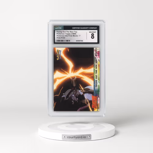 1999 Pokémon the First Movie #7 Trying Out The New Toy - First Print (Blue Topps Logo) (CGC 8 NM-MT)
