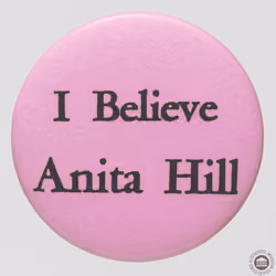 Pinback button featuring "I Believe Anita Hill" 2010.69.9