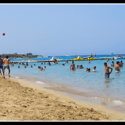 Nissi Beach in Cyprus with its old pots and clear blue waters.