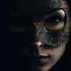 Woman wearing a masquerade mask