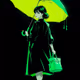 woman with a green umbrella