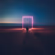 A person walking towards a pink square