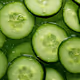 A group of cucumbers in water.
