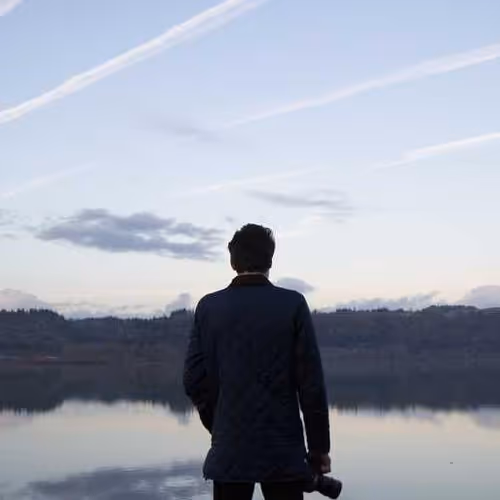 Holding Listening Traveller